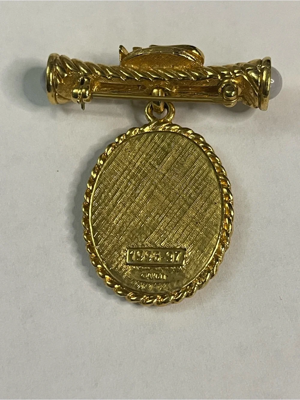 vintage gold-tone Avon President's Club award brooch from 1996-1997